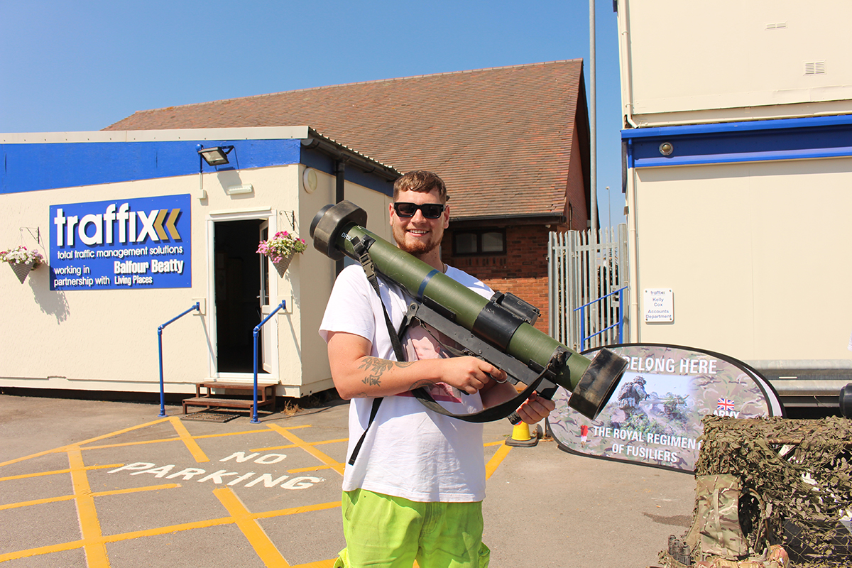 traffix-operative-holding-a-rocket-launcher Traffix operative holding a rocket launcher